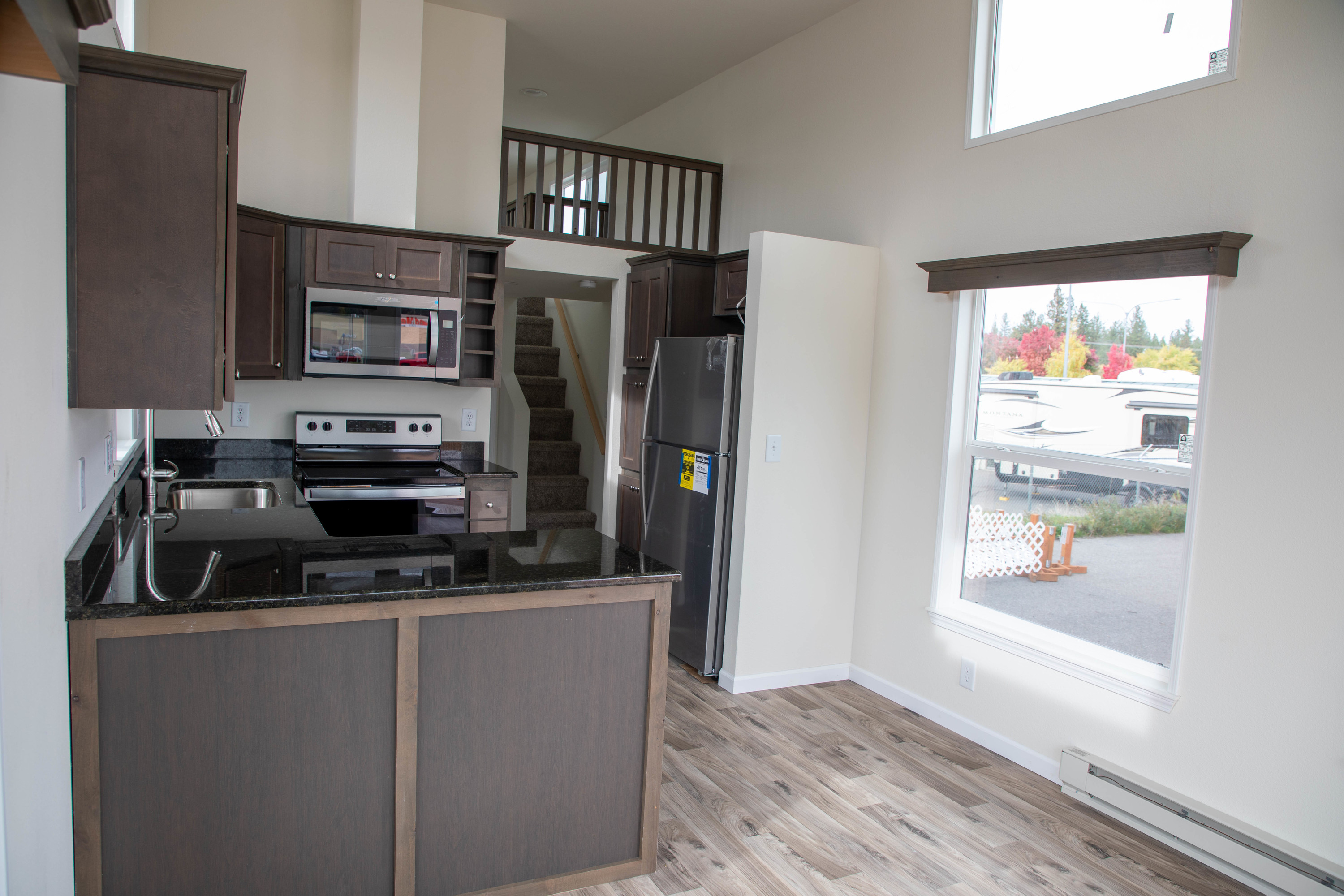 Large kitchen with breakfast bar and extra pantry cabinets